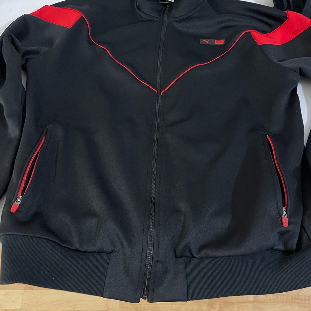 TMC Puma Black Jacket and Track pants with Red Accents The Marathon Continues